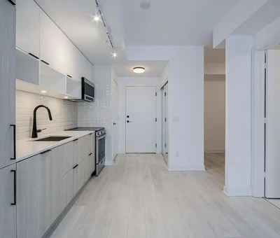 Professional Toronto painters transforming modern living room with expert craftsmanship